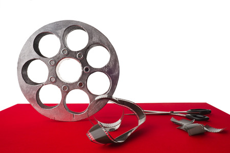 Reel of film on the red tableの写真素材
