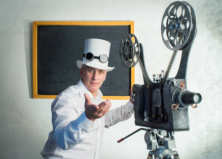 Cameraman with with a film projectionの写真素材