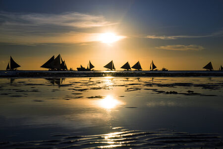 Evening seascape with sailboatsの写真素材