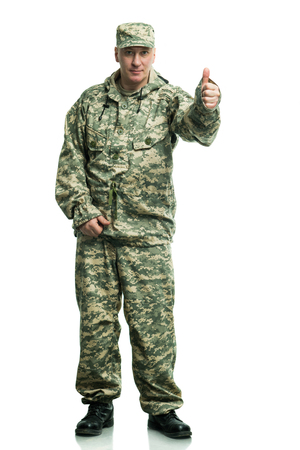 Soldier in camouflage on the white backgroundの写真素材
