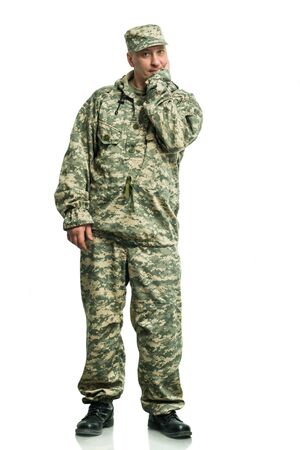 Soldier in camouflage on the white backgroundの写真素材