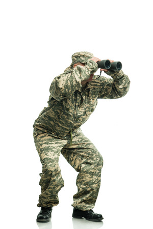 Soldier in uniform with binocularsの写真素材