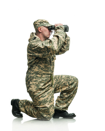 Soldier in uniform with binocularsの写真素材