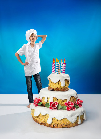 Cheerful confection with a birthday cakeの写真素材