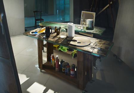 Artist's workshop with a paints, tables, easels and stretchersの写真素材