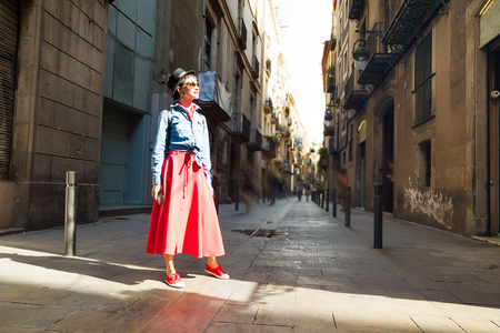 Tourism in Europe, woman tourist on the street of Barcelonaの写真素材