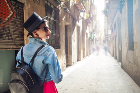 Tourism in Europe, woman tourist on the street of Barcelonaの写真素材