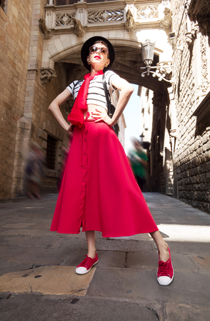 Tourism in Europe, woman tourist on the narrow street of Barcelonaの写真素材