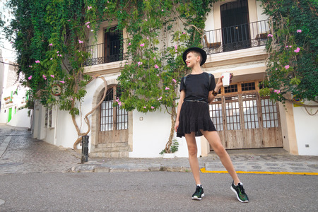 Tourism in Europe, woman tourist on the street near buildingの写真素材