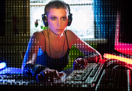 Female hacker working on a code with digital interface aroundの写真素材