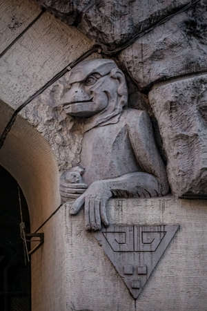 Statue of a sitting monkey - stone carving, Rigaの写真素材
