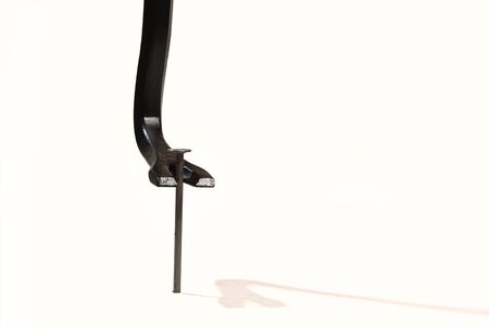 crowbar and a nail on a white background.の写真素材