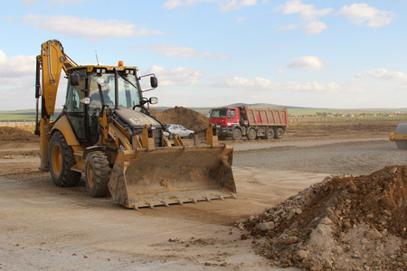 TULCEA, ROMANIA - NOVEMBER 08: Heavy construction equipment working on a runway as part of the...