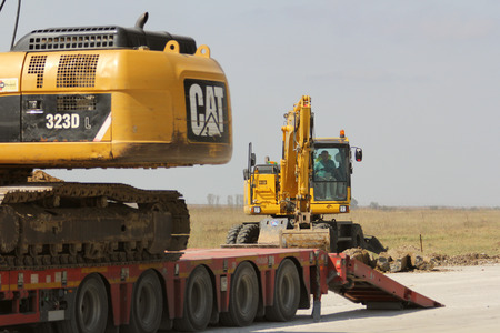 TULCEA, ROMANIA - NOVEMBER 08: Heavy construction equipment working on a runway construction site as part of the Danube Delta international airport expansion plan on November 08, 2015 in Tulcea, Romania.のeditorial素材
