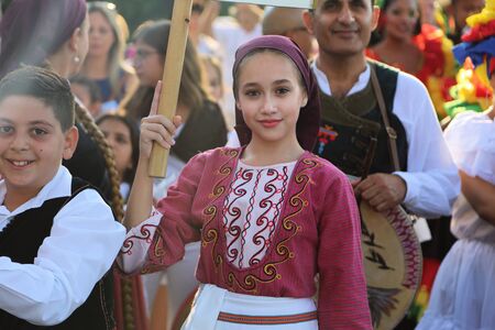 TULCEA, ROMANIA - AUGUST 08: Cyprus dancer in traditional costume at the International Folklore Festival for Children and Youth - Golden Fish on August 08, 2017 in Tulcea, Romaniaのeditorial素材