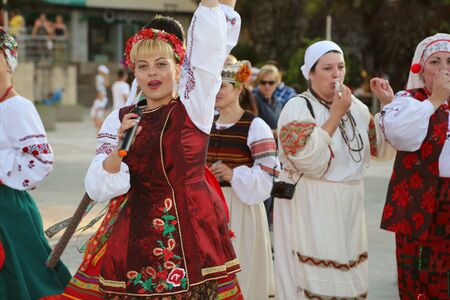 TULCEA, ROMANIA - AUGUST 08: Ukrainian group of dancers in traditional costumes at the International Folklore Festival for Children and Youth - Golden Fish on August 08, 2017 in Tulcea, Romaniaのeditorial素材