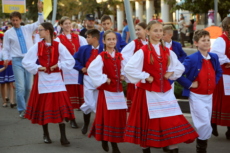 TULCEA, ROMANIA - AUGUST 08: Polish national costumes parade at the International Folklore Festival for Children and Youth - Golden Fish on August 08, 2017 in Tulcea, Romaniaのeditorial素材