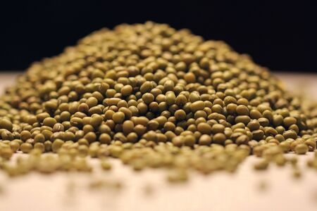 Heap of mung beans isolated on blackの写真素材