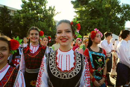 TULCEA, ROMANIA - AUGUST 08: Bulgarian dancer in traditional costume at the International Folklore Festival for Children and Youth - Golden Fish on August 08, 2018 in Tulcea, Romania.のeditorial素材