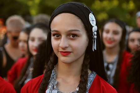 TULCEA, ROMANIA - AUGUST 08: Georgian dancer in traditional costume at the International Folklore Festival for Children and Youth - Golden Fish on August 08, 2018 in Tulcea, Romania.のeditorial素材