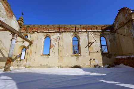 Ruins of an old church in winterの写真素材
