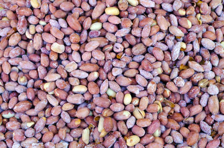 Bunch of roasted and salted peanuts in the market