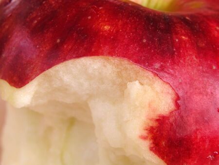 Extreme close-up of an apple with a bite missingの写真素材