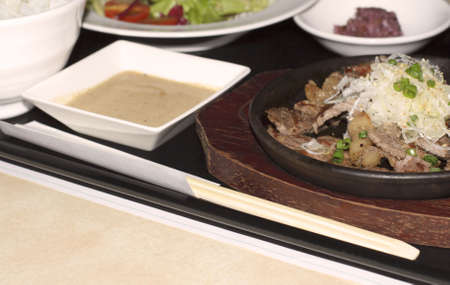 Chinese food on a specific restaurant tableの写真素材