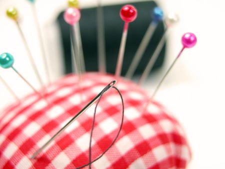 Sew still life-the focus is on the needle hole,the rest is out of focus