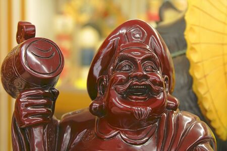 Close-up image of a ceramic Japanese traditional character.の写真素材