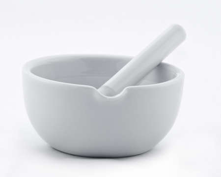 Image of a ceramic grinding mortar isolated against a white background.の写真素材