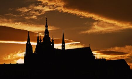 Dusk silhouettes of the Prague Castle the bigest castle in the world.の写真素材