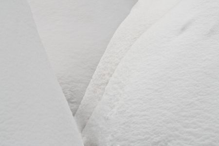 Abstract image of snow on curved shapes.の写真素材