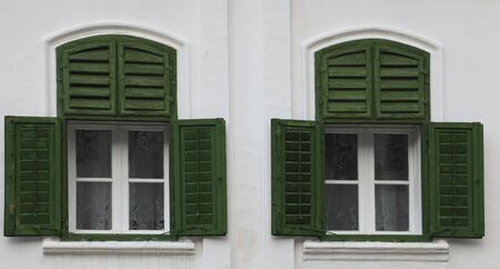 Traditional house's windows and wooden blinds-specific for Transylvanian Saxons architecture.