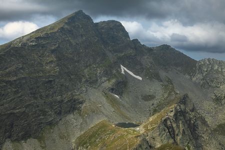 Caltun lake and importants peaks (Caltun and Lespezi) in Fagras Mountains,from Romania.