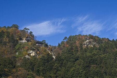 Autumn landscape in Yamadera,Japan. You can see the temples built on the steep rocky hillsides which are unusual and represent an important touristic attraction. The temples are well-known as a place for an important Japanese sect, Tendai, which is relateの写真素材