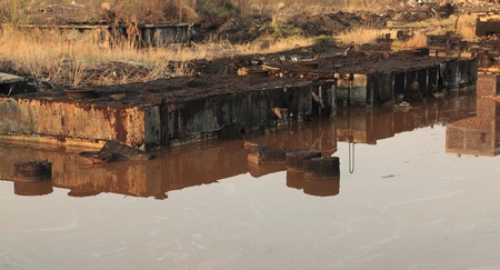 Image of a pond with very toxic industrial drosses. Location: Copsa Mica,Romania, a town which in 1990 was known as one of the most polluted places in Europe. の写真素材