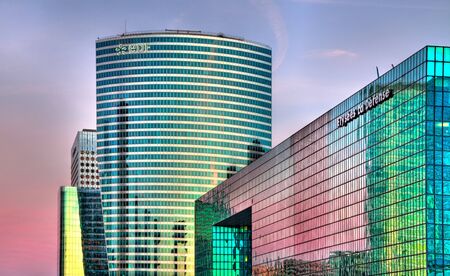 Paris- April 1st, 2012: Detail of some skyscrapers at the sunset in La Defense, in teh western part...