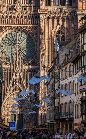 Strasbourg, France- December 28, 2011:Crowd of people in the Rue de Merciere street leading to the Cathedral Square in Strasbourg during the winter holidays.のeditorial素材