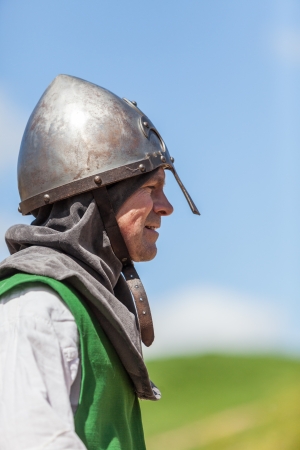Montmedy, France, April 29th, 2012: Profile of a knight with helmet during a reenactment festival in Montmedy, France.のeditorial素材