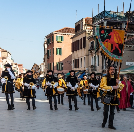 Venice,Italy,February 26th 2011:Parade of a traditional medieval street orchestra marching in a...