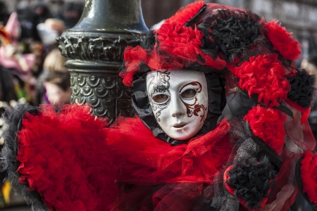 Venice, Italy-February 18, 2012:Environmental portrait of a person wearing a complex disguise during The Venice Carnival days.のeditorial素材