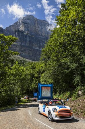 Col du Granier,France-July 13th, 2012:The car of Ibis Budget Hotels during the passing of the Publicity Caravan on the category I climbing route to mountain pass Ganier, in the 12 stage of the 2012 edition of Le Tour de France, the biggest cycling race inのeditorial素材