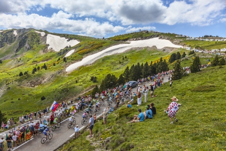 Col de Pailheres,France- July 07 2013: The peloton climbing the road to Col de Pailheres in Pyrenees Mountains during the stage 8 of the 100 edition of Le Tour de France on 7 July 2013.のeditorial素材