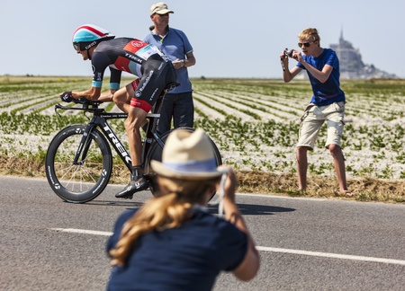 Le Pont Landais,France-July 10, 2013  The Luxembourgish cyclist Andy Schleck from RadioShack-Leopard Team cycling in front of exciting audience during the stage 11 of the edition 100 of Le Tour de France 2013, a time trial between Avranches and Mont Saintのeditorial素材
