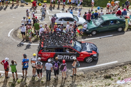 Col de Pailheres,France- July 06 2013  Technical car of BMC procycling team climbing the road to Col de Pailheres in Pyrenees Mountains during the stage 8 of the 100 edition of Le Tour de France on 6 July 2013  BMC is a cycling product manufacturer locateのeditorial素材
