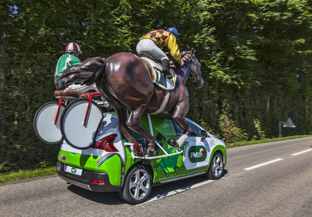 Illiers Combray, France, July 21st 2012   The vehicle of PMU in the publicity caravan driving on a rural road, during the 19th stage- a time trial between Bonneval and Chartres- of Le Tour de France 2012 のeditorial素材