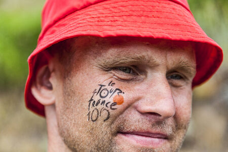 Alpe-D Huez,France- July 18, 2013  Portrait of a young man fan of Le Tour de France on the road to Alpe-D Huez during the stage 18 of the edition 100 of Le Tour de France 2013 のeditorial素材