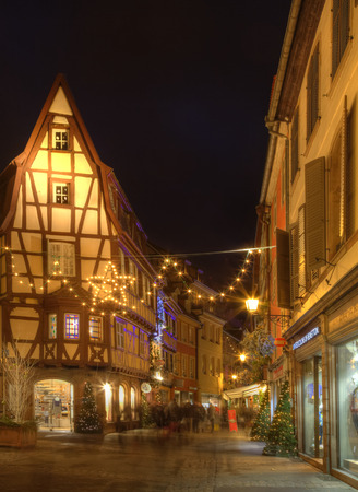 Colmar, France - December 7, 2013: Rue des Bouiangers beautifully illuminated during the winter holidays season in Colmar,Alsace,France.のeditorial素材
