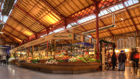 Colmar, France - December 06, 2013: People shopping in the vegetables market in COlmar, Alsace, France. HDR image.のeditorial素材